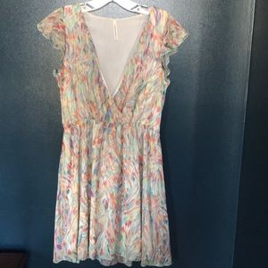 Fun flirty Butterfly sleeved dress!